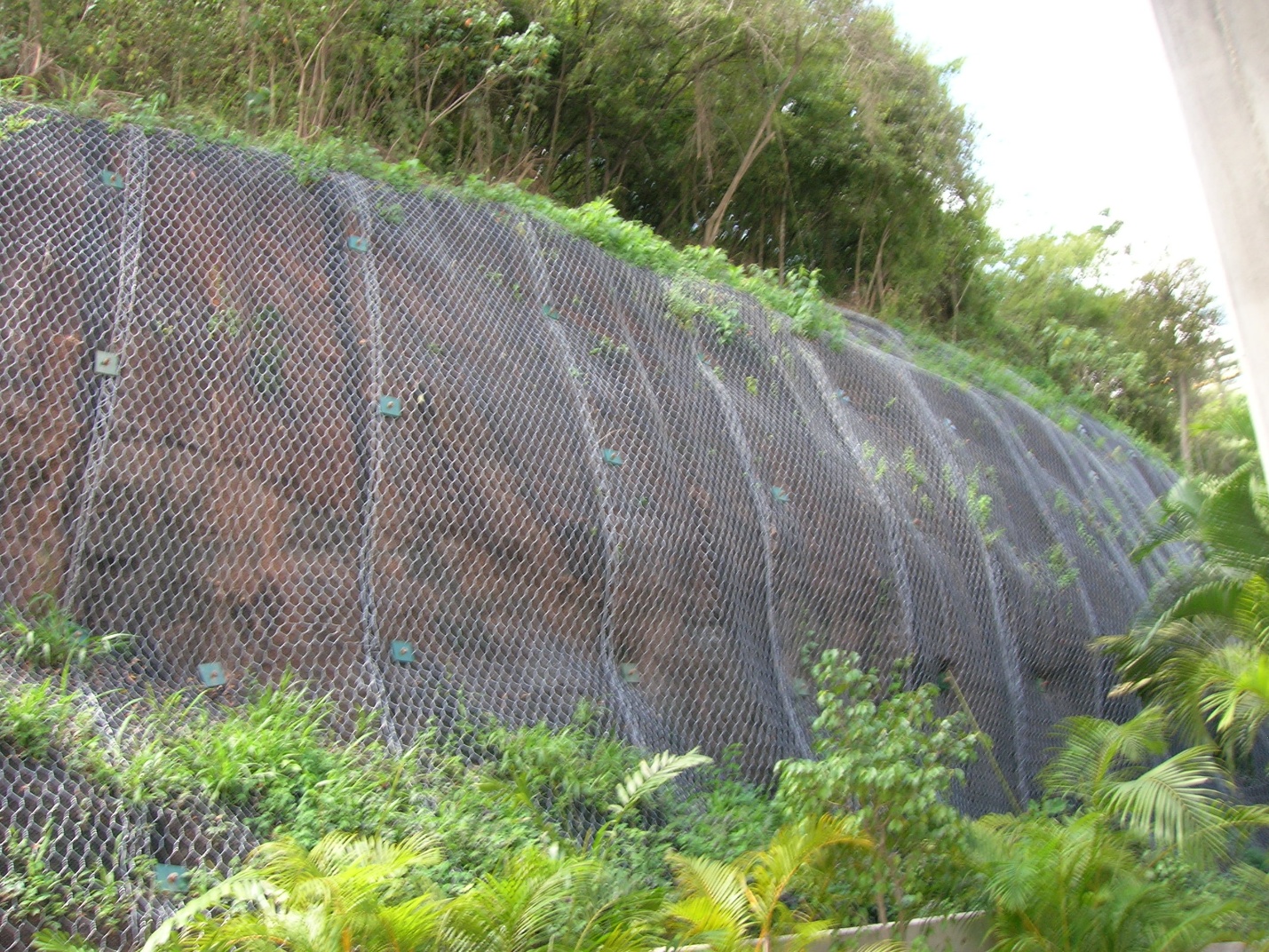 Soil nailing and slope stabilization